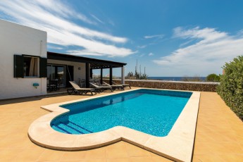 Villa Pura Vida on the seafront in Minorca, Spain, for 6 persons